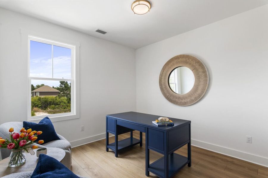 Furnished interior in a model home at Brizo in Santa Rosa Beach (Image 31).