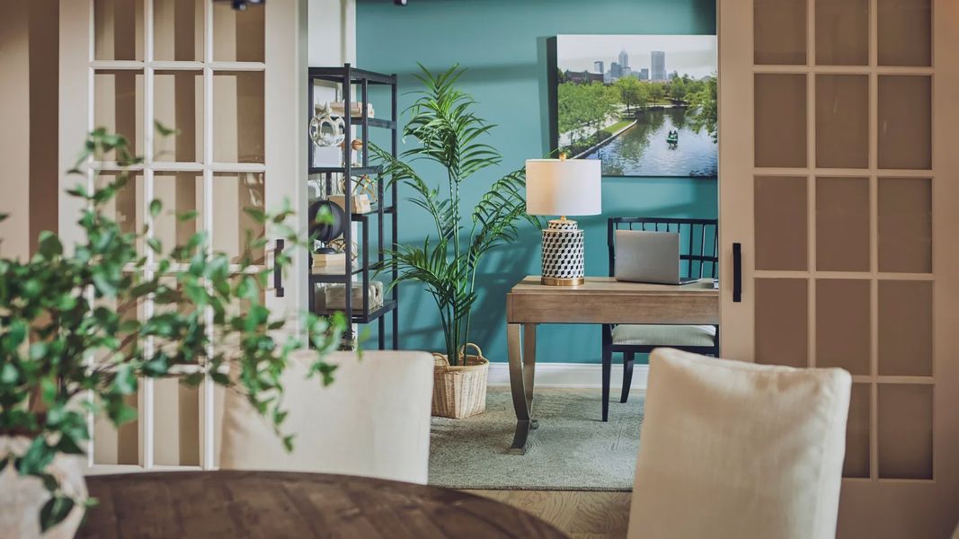 Furnished interior in a model home at The Courtyards at Bailey Farms in Dacula (Image 21).