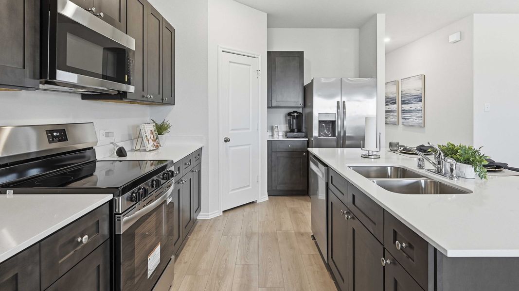 Furnished interior in a model home at Northspur in Terrell (Image 9).