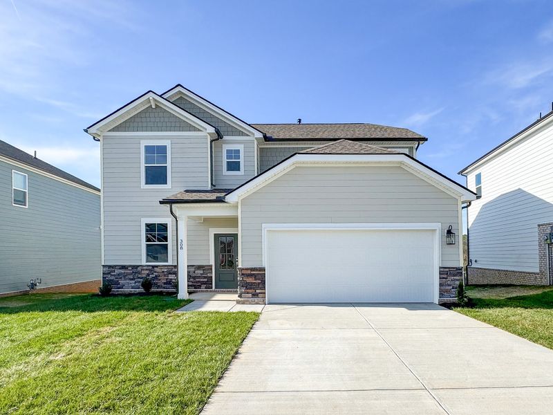A house with a garage. A house with a garage.