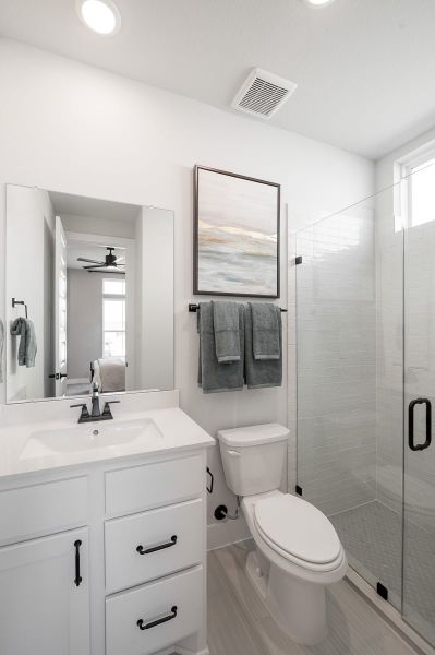 Furnished interior in a model home at Sienna 60’ in Missouri City (Image 34).