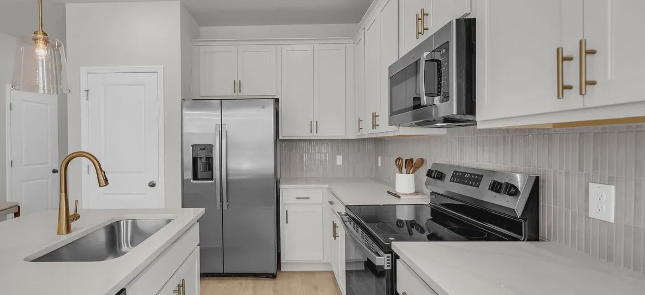 Furnished interior in a model home at Windward Village in Summerville (Image 13).
