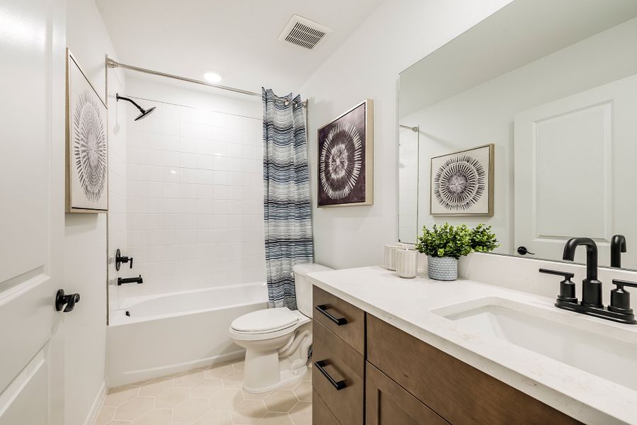 Furnished interior in a model home at Towns at Greenleaf in Oviedo (Image 10).