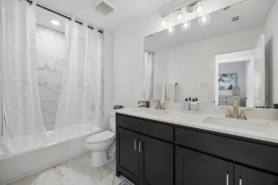 Furnished interior in a model home at Westside Preserve in Midlothian (Image 27).