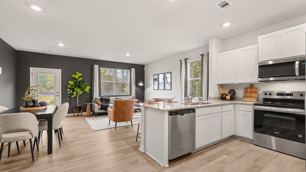Furnished interior in a model home at Woodbury Park in Atlanta (Image 7).