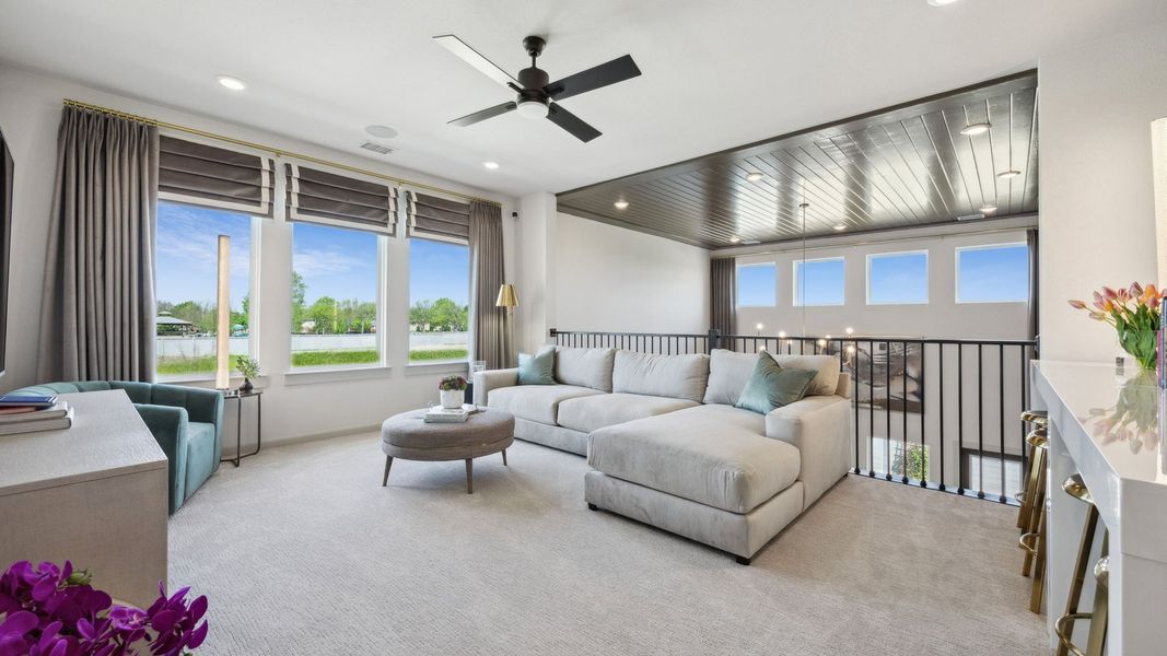 Furnished interior in a model home at Painted Tree - Woodland West in McKinney (Image 38).