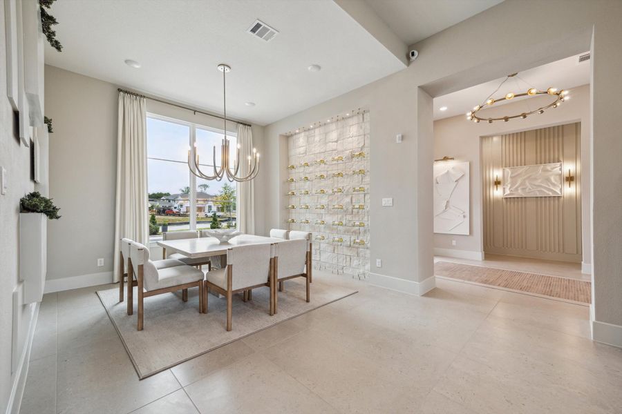 Furnished interior in a model home at ARTAVIA® - 65' Art in Conroe (Image 6).