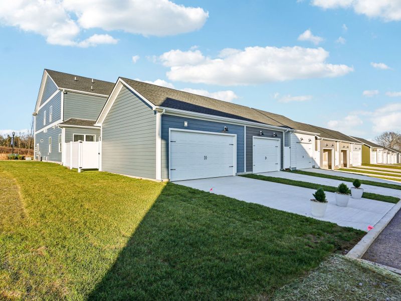 Front exterior of a home in the Greystone - Vista Townhomes community, located in Smyrna, TN (Image 2).