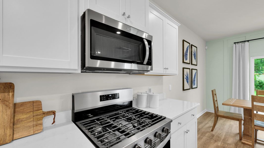 Furnished interior in a model home at The Cove at Mallard Crossing in Summerville (Image 3).