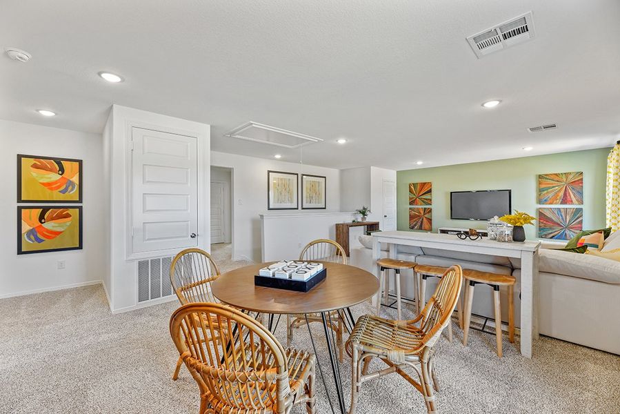 A room with a table and chairs. A room with a table and chairs.