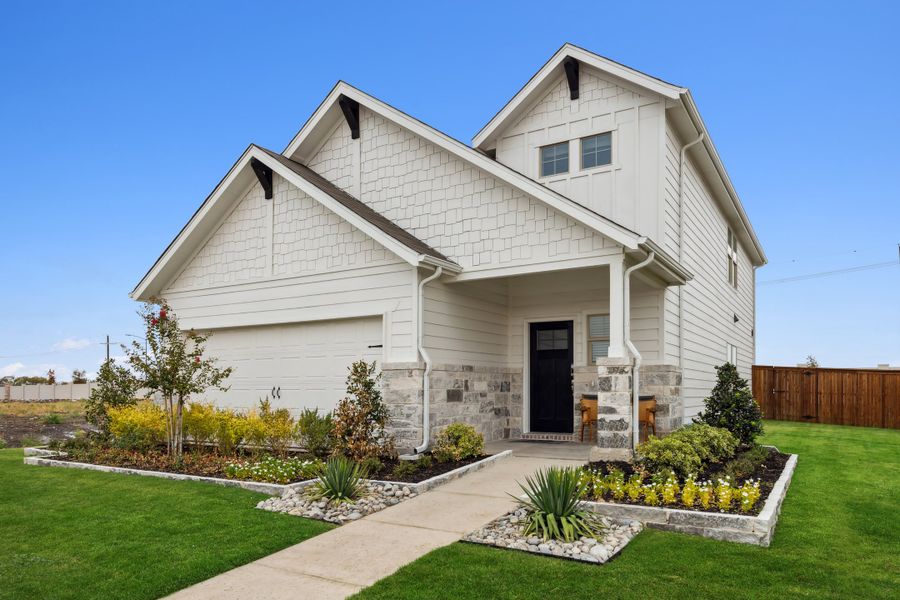 Front exterior of a home in the Lakehaven - Spring Series community, located in Farmersville, TX (Image 5). Front exterior of a home in the Lakehaven - Spring Series community, located in Farmersville, TX (Image 5).