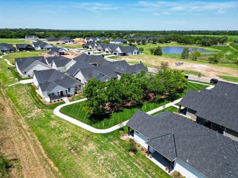 Aerial view of the The Courtyards at Jacobs Farm community in Wichita, KS, showing layout and nearby surroundings (Image 14). Aerial view of the The Courtyards at Jacobs Farm community in Wichita, KS, showing layout and nearby surroundings (Image 14).