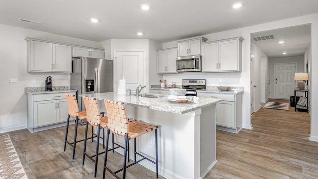Furnished interior in a model home at Edinborough in Gibsonville (Image 10).