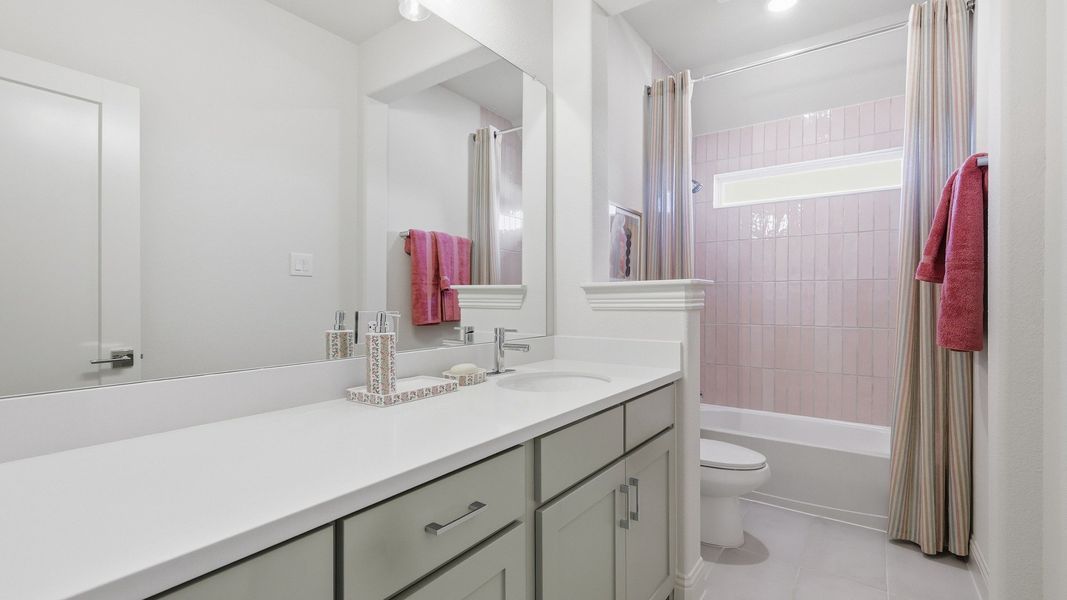 Furnished interior in a model home at Lakeshore Bluffs in Shady Shores (Image 39).