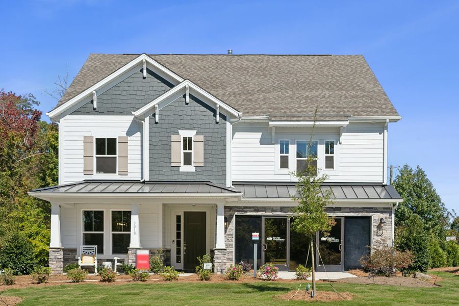 Front exterior of a home in the River Falls community, located in Tega Cay, SC (Image 2).