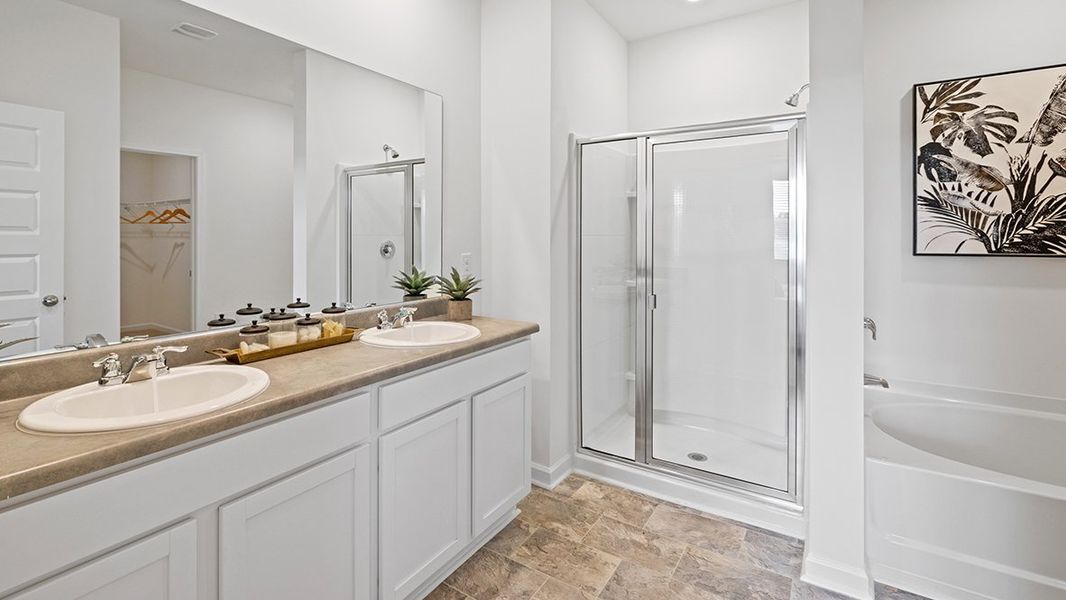 Furnished interior in a model home at The Preserve at Agricultural Village in Perry (Image 12). Furnished interior in a model home at The Preserve at Agricultural Village in Perry (Image 12).