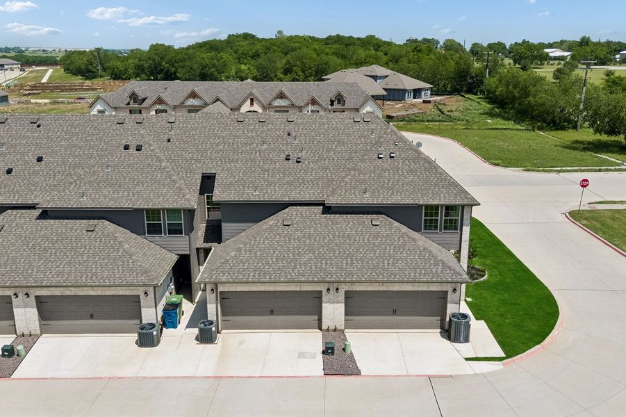 Front exterior of a home in the Sanger Circle – Townhomes community, located in Sanger, TX (Image 73). Front exterior of a home in the Sanger Circle – Townhomes community, located in Sanger, TX (Image 73).