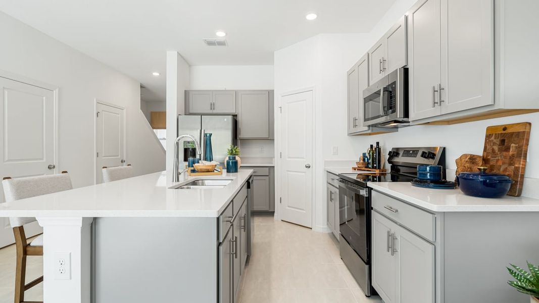 Furnished interior in a model home at The Towns at Tiburon in Nokomis (Image 11).
