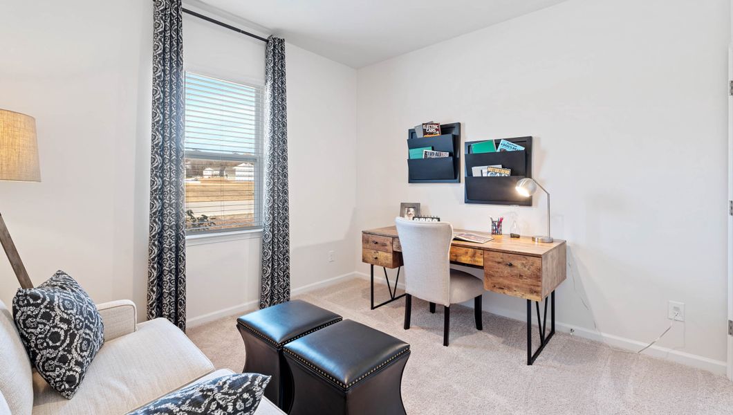 Furnished interior in a model home at Sage Grove in Lyman (Image 6).