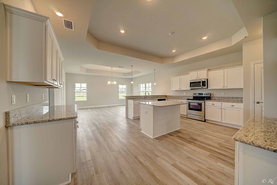 Furnished interior in a model home at Cedar Creek at Deerpoint Lake in Panama City (Image 5).