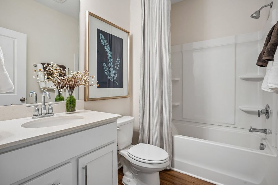 Furnished interior in a model home at South Lake Townes at Flowers Plantation in Clayton (Image 58).