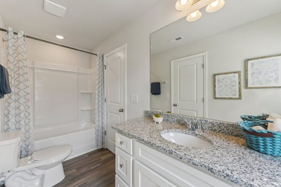 Furnished interior in a model home at The Hills at Cedar Creek in Winder (Image 70).