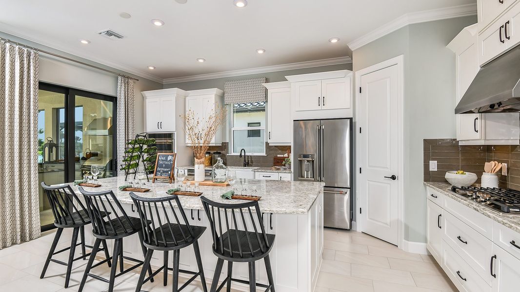 Furnished interior in a model home at Esplanade by the Islands in Naples (Image 45).