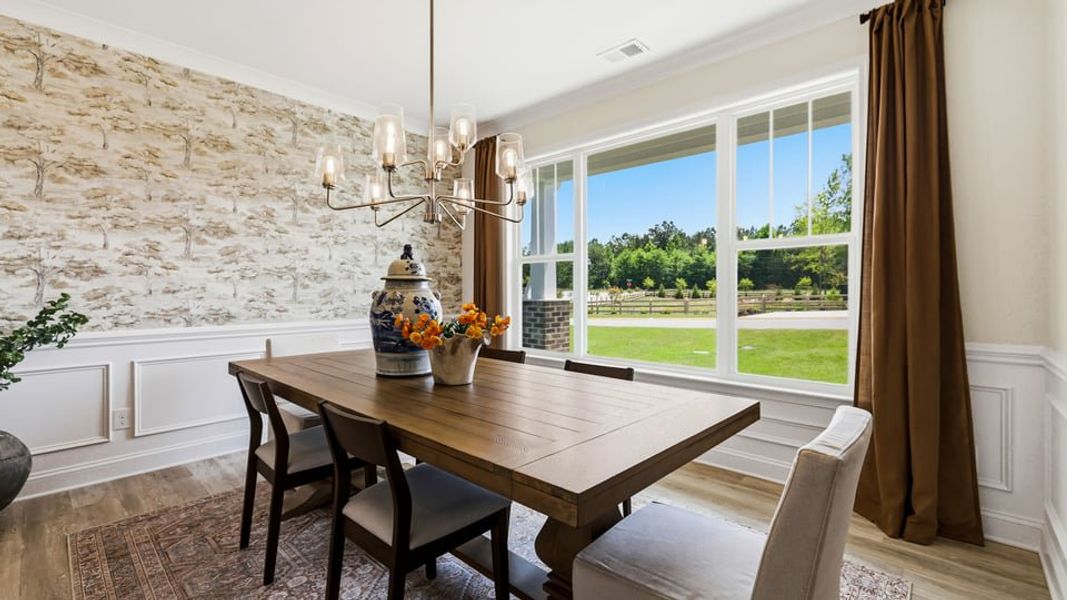 Furnished interior in a model home at Arrowood Acres in Enoree (Image 8).