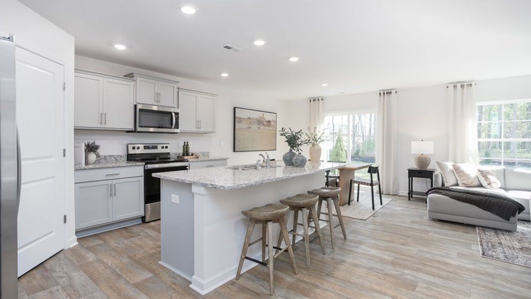 Furnished interior in a model home at River's Edge in Mayodan (Image 3).