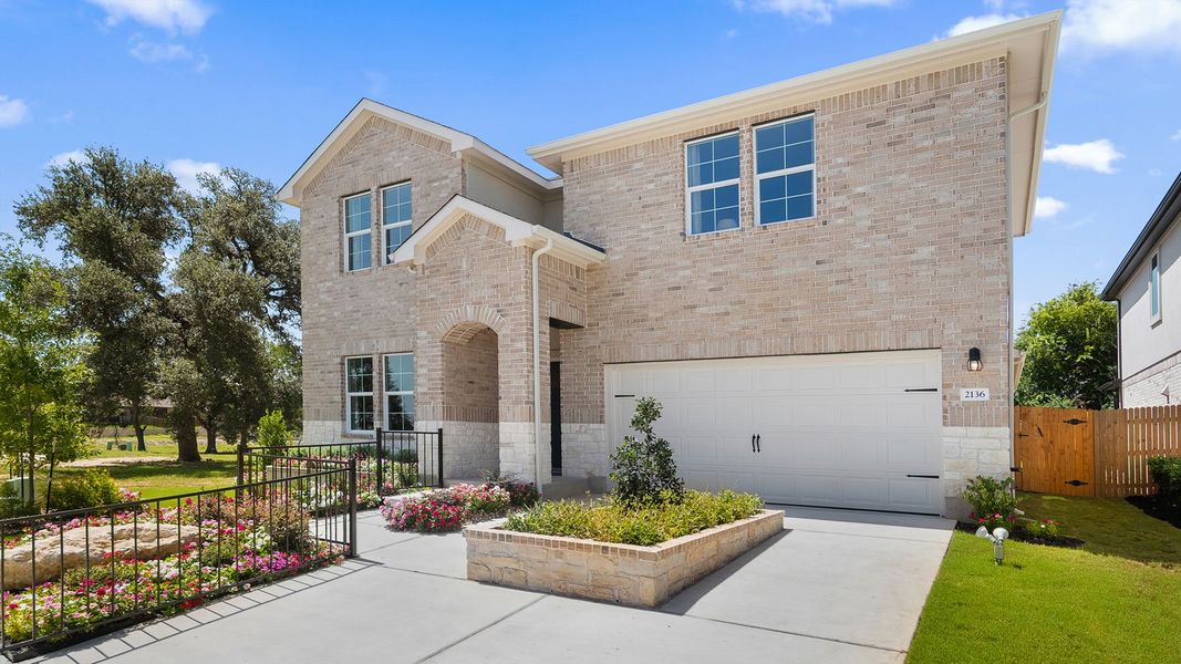Front exterior of a home in the Rosenbusch Ranch community, located in Leander, TX (Image 12).
