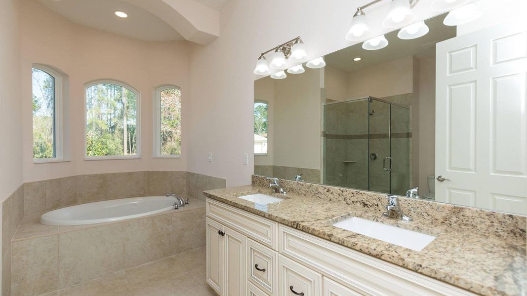 A showcase of a new construction home by Florida Green Construction, highlighting their design and quality (Image 11).