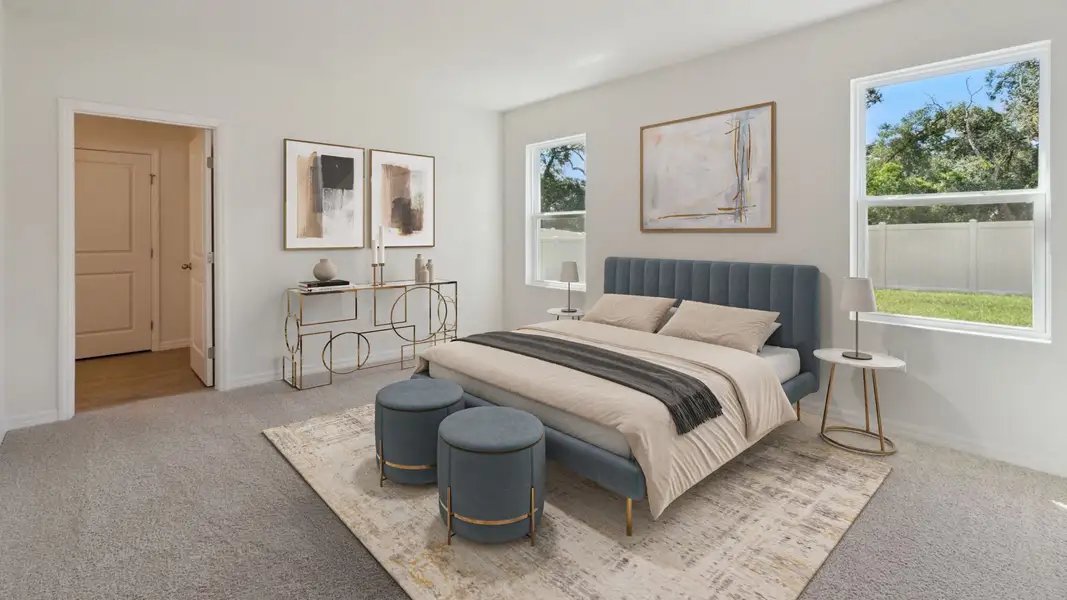 Furnished interior in a model home at Ironwood in Daytona Beach (Image 9).