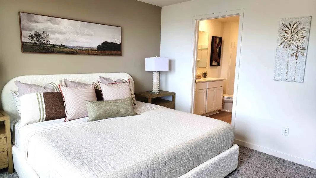 Furnished interior in a model home at Vineland Reserve in Osteen (Image 12).