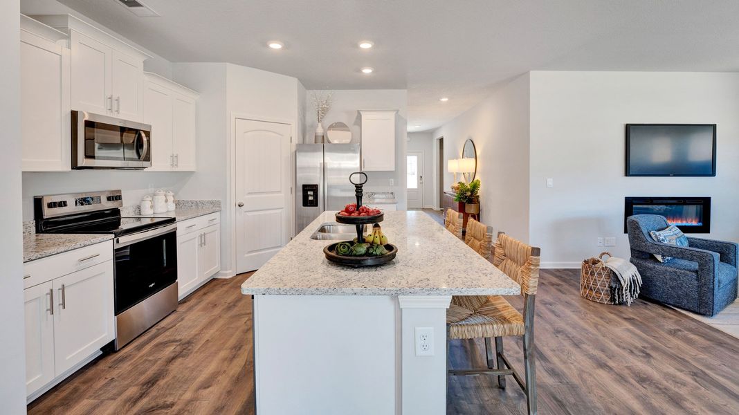 Furnished interior in a model home at Village Park in Oakland (Image 14).