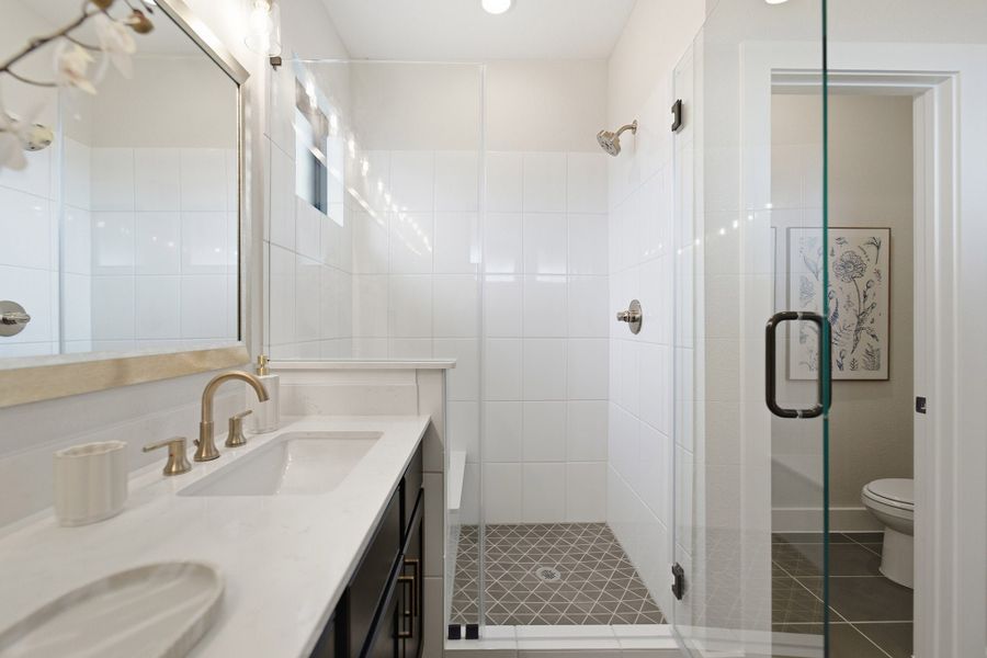 Furnished interior in a model home at Grand Magnolia in Waller (Image 37).