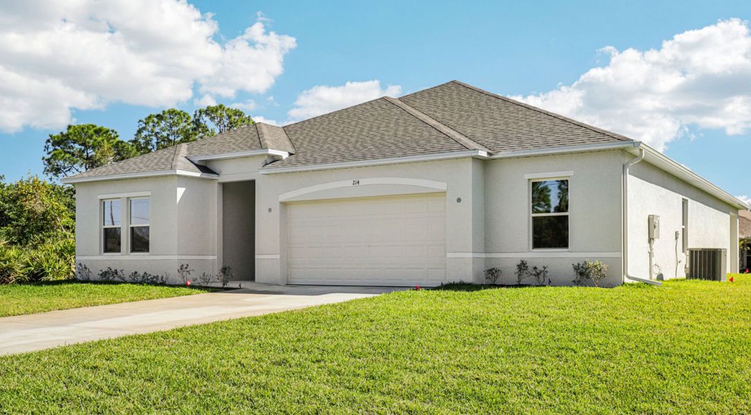 Front exterior of a home in the Palm Coast community, located in Palm Coast, FL (Image 4).