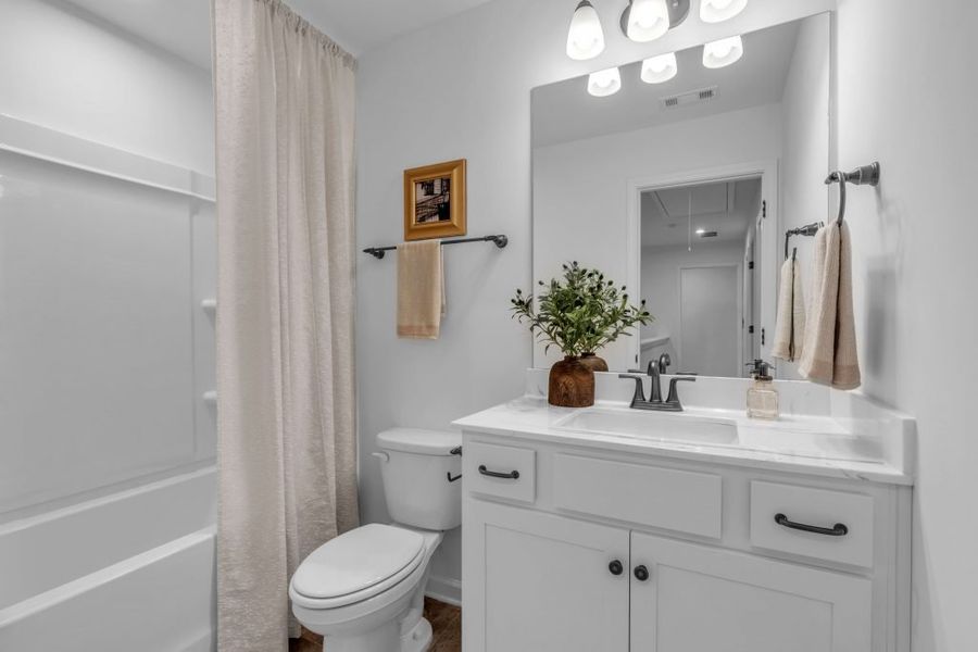 Furnished interior in a model home at The View at Groover's Lake in Lithia Springs (Image 21).