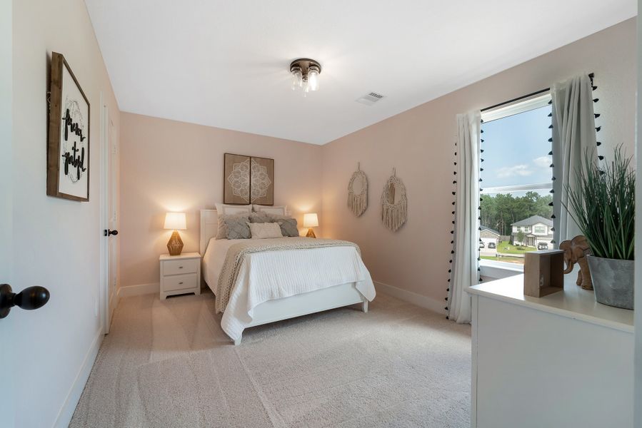 Furnished interior in a model home at Magnolia Springs in Montgomery (Image 38).