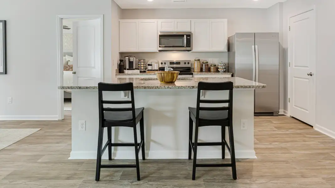 Furnished interior in a model home at Vineyard Trail in Jacksonville (Image 15).