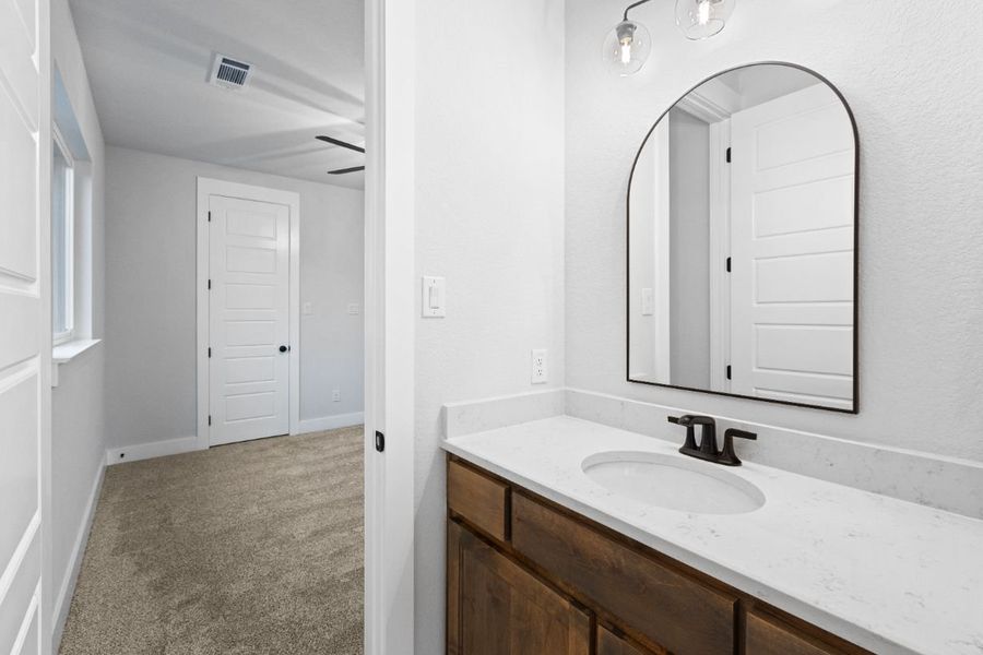 Furnished interior in a model home at Lola Creek Ranch in Boyd (Image 40).