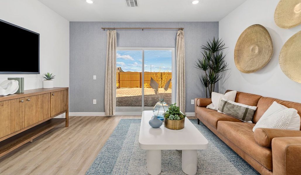 Furnished interior in a model home at Redford Estates in Tucson (Image 15).
