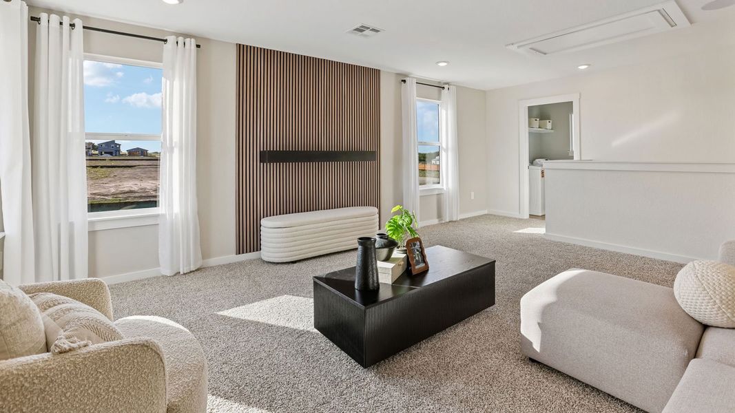 Furnished interior in a model home at Frontier in Mustang Ridge (Image 37).