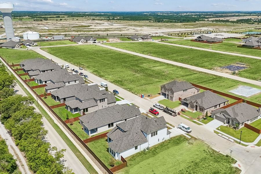 Front exterior of a home in the Parkmont – Timberbrook community, located in Justin, TX (Image 35).