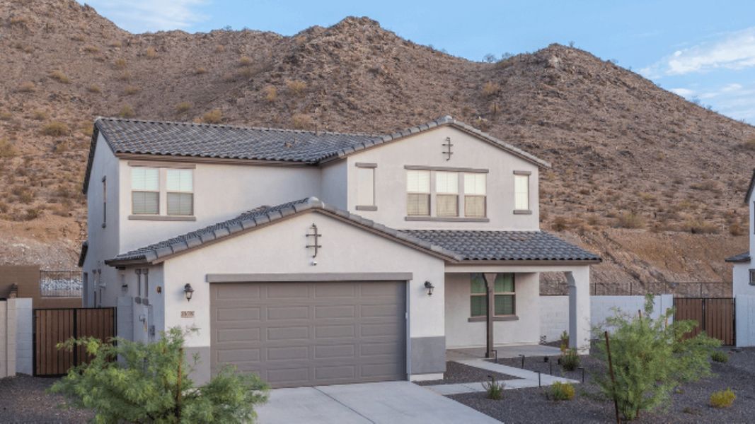 Front exterior of a home in the The Ridge at Sienna Hills community, located in Buckeye, AZ (Image 5).
