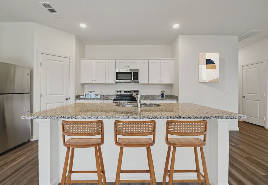 Furnished interior in a model home at Pender Woods at Cane Bay in Summerville (Image 6). Furnished interior in a model home at Pender Woods at Cane Bay in Summerville (Image 6).