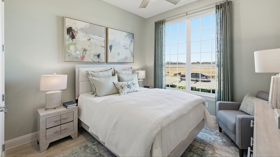 Furnished interior in a model home at Lakeshore Bluffs in Shady Shores (Image 9).
