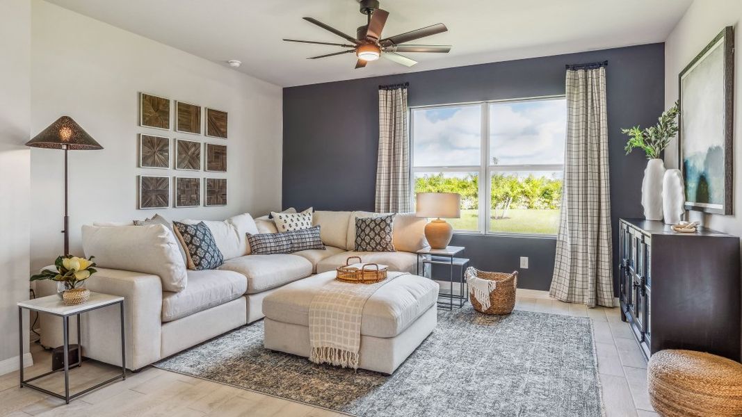 Furnished interior in a model home at Cali Cove in Punta Gorda (Image 3).