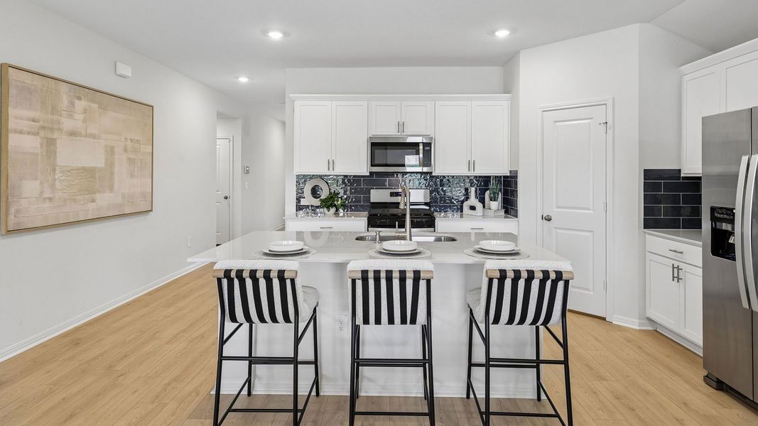 Furnished interior in a model home at Bar W Ranch in Leander (Image 43).