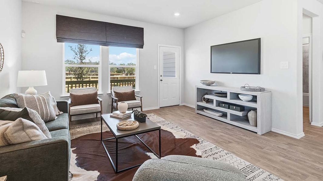 Furnished interior in a model home at Blue Ridge Ranch in San Antonio (Image 9).