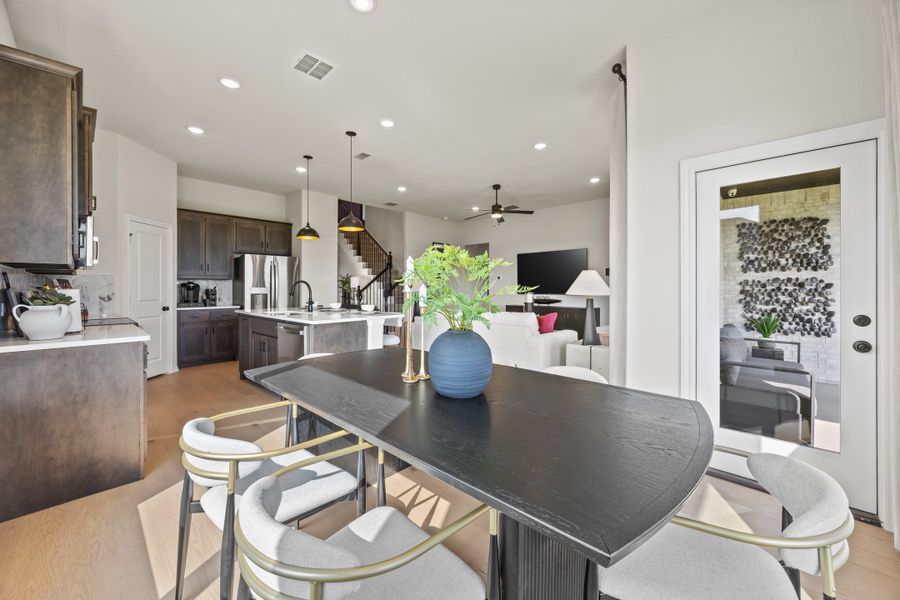 Furnished interior in a model home at El Dorado in Granbury (Image 13).